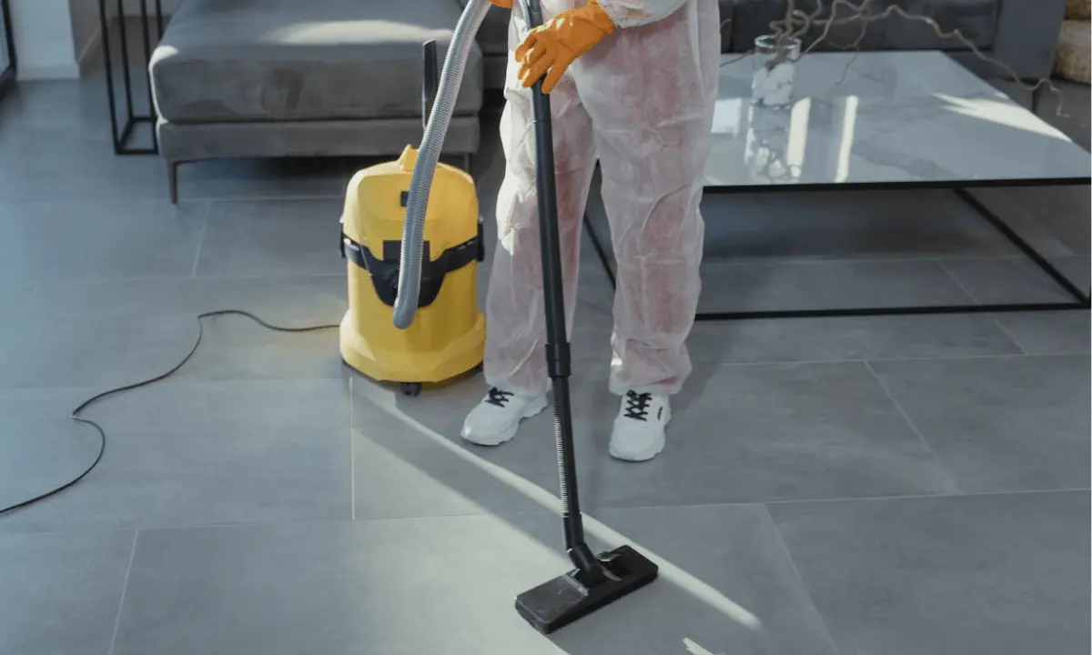 cleaner cleaning floors of a room
