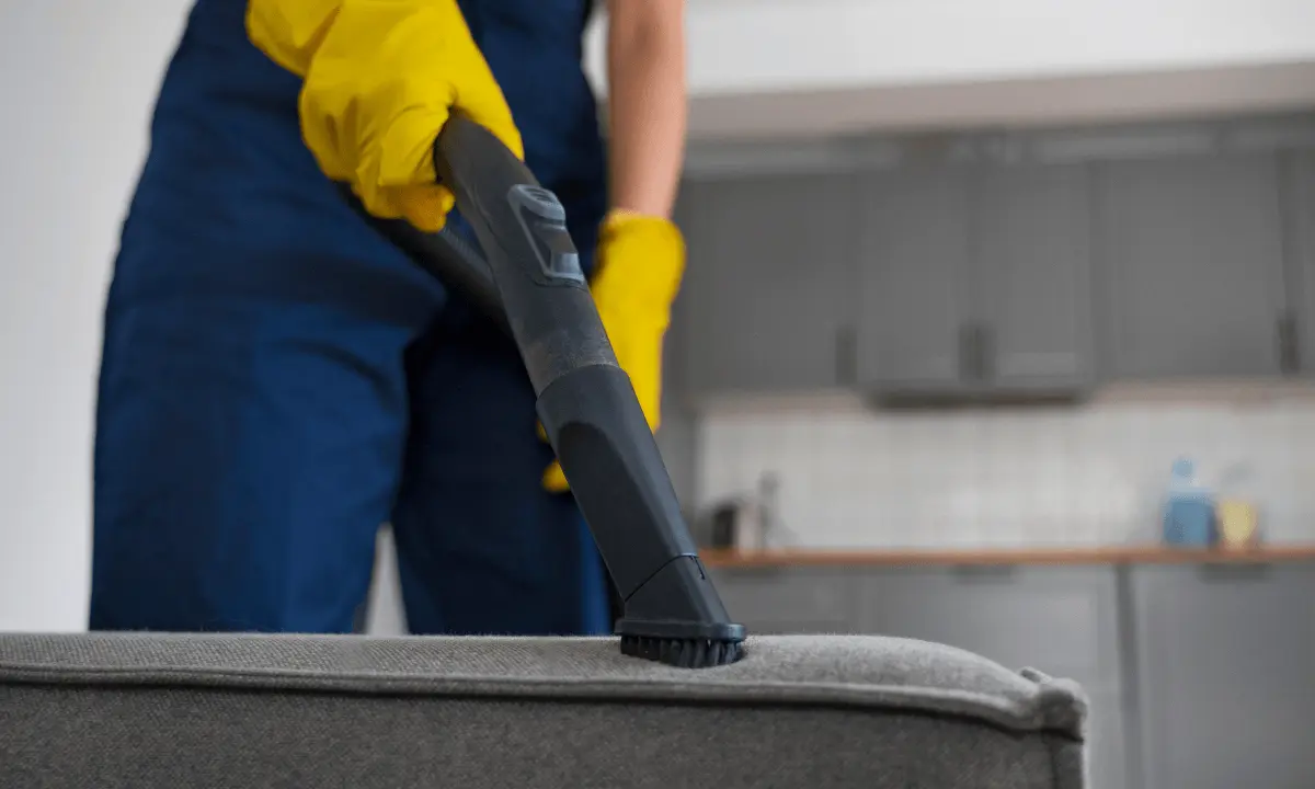 Sofa Cleaning Kingston | All Fabric Types | Starts £32 1 sofa-cleaner-vacuuming-sofa.webp
